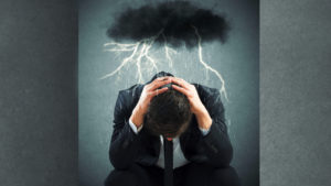 man with storm cloud over head, difficulty