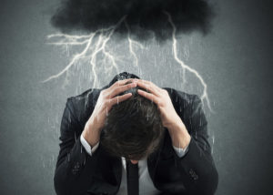 storm cloud over man, negative energy